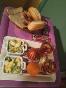 a tray with two trays of food on a table at Chambre d'Hôte ROMARICA in Saint-Sigismond