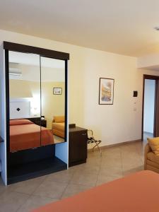 Postel nebo postele na pokoji v ubytování Hotel Orizzonte