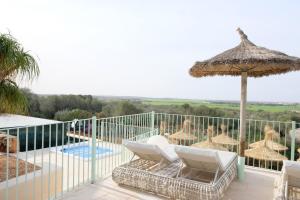 A balcony or terrace at Finca Hotel Rural Es Turó