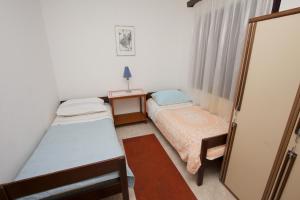 Posteľ alebo postele v izbe v ubytovaní Apartment Fish
