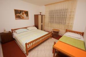 Posteľ alebo postele v izbe v ubytovaní Apartment Fish