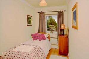 Postel nebo postele na pokoji v ubytování Apartment 263 - Clifden