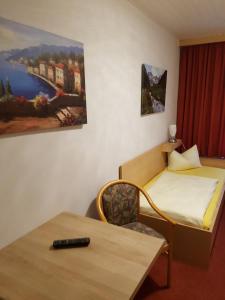 Säng eller sängar i ett rum på Hotel Giesing