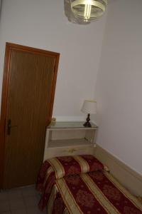 Letto o letti in una camera di Albergo Basilea
