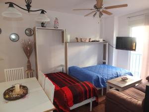 Postel nebo postele na pokoji v ubytování Piso Río Campanilla