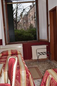 Letto o letti in una camera di Albergo Basilea