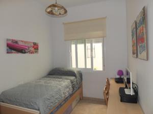 En eller flere senge i et værelse på Apartamento Mijas Costa, Las Lagunas