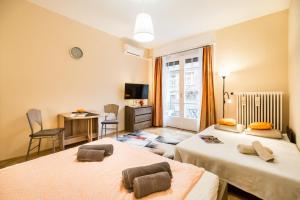 Postel nebo postele na pokoji v ubytování BpR Orange Dream Apartment