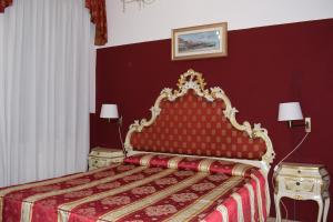 Letto o letti in una camera di Albergo Basilea