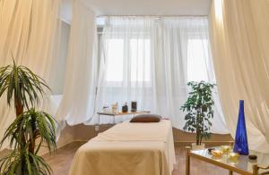 Postel nebo postele na pokoji v ubytování Hotel Continental