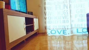 TV a/nebo společenská místnost v ubytování Marazul Lighthouse