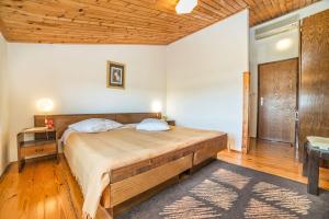 Postel nebo postele na pokoji v ubytování Apartments and Rooms Ana Pomer 217