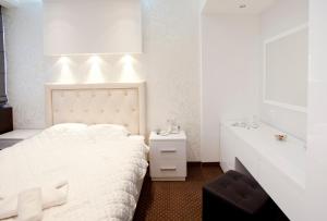 Letto o letti in una camera di Centrum Sobe Rooms Čačak