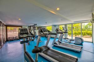 a gym with treadmills and elliptical machines at Estelar Playa Manzanillo - All inclusive in Cartagena de Indias