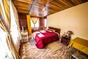 Un pat sau paturi într-o cameră la Hotel Donde Ivan
