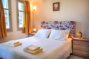 Ένα ή περισσότερα κρεβάτια σε δωμάτιο στο Villa View Studios