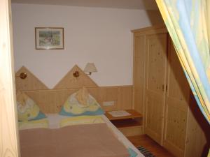 Łóżko lub łóżka w pokoju w obiekcie Pension - Bauernhof