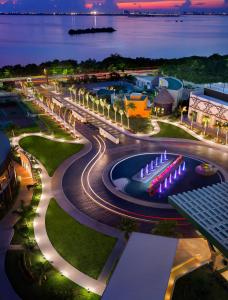 a city street at night with street lights at Hard Rock Hotel Cancun - All Inclusive in Cancún