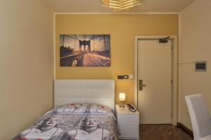 Posteľ alebo postele v izbe v ubytovaní Hotel Il Giardino