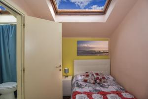 Posteľ alebo postele v izbe v ubytovaní Hotel Il Giardino