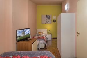 Posteľ alebo postele v izbe v ubytovaní Hotel Il Giardino