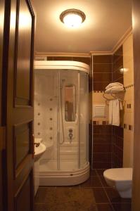 a bathroom with a shower and a sink at Grand Hotel de Londres in Istanbul