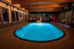a large swimming pool in a large room at Bavarian Inn, Black Hills in Custer