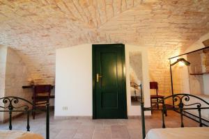 A bed or beds in a room at Maison MilleOttocento