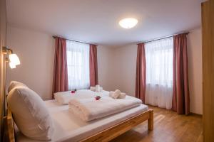 Ein Bett oder Betten in einem Zimmer der Unterkunft Appartement Holzleiten