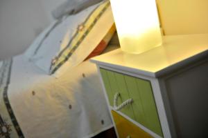 A bed or beds in a room at Il Nido del Canterino