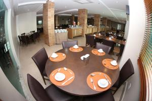 Um restaurante ou outro lugar para comer em Real Classic Bahia Hotel