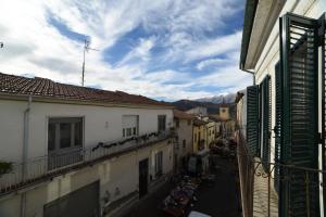 a view from a balcony of a street with buildings at B&B" del Castello" in Roccascalegna