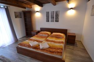 a bedroom with a bed in a room at Chalupa Pohoda Demänová in Liptovský Mikuláš – Demänová
