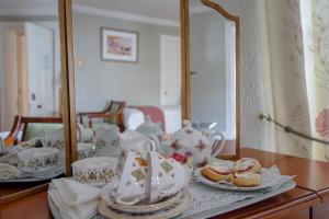 Ένα ή περισσότερα κρεβάτια σε δωμάτιο στο Brennan's Accommodation Glenties