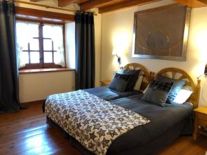 Posteľ alebo postele v izbe v ubytovaní Casa de piedra con encanto en el bonito pueblo de Bagergue