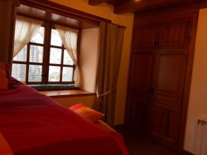 Posteľ alebo postele v izbe v ubytovaní Casa de piedra con encanto en el bonito pueblo de Bagergue
