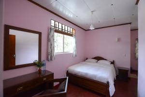 Postel nebo postele na pokoji v ubytování Mount Mary Inn