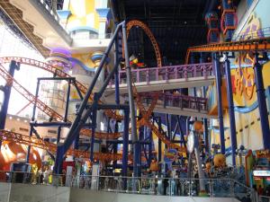 a roller coaster in an indoor amusement park at FnF Suite @ Time Square in Kuala Lumpur
