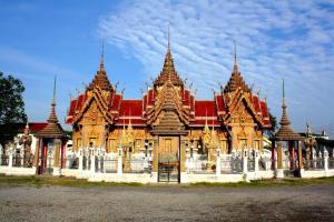 a large building with several towers on top of it at T.M. Home, Hatyai in Hat Yai