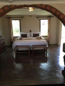 Kama o mga kama sa kuwarto sa Musungwa Safari Lodge