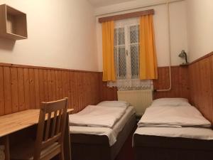 Posteľ alebo postele v izbe v ubytovaní Chata Luna