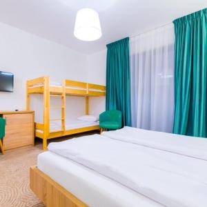 Ένα ή περισσότερα κρεβάτια σε δωμάτιο στο Hotel DADA Termal