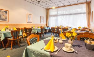 Un restaurante o sitio para comer en Hotel Quellental