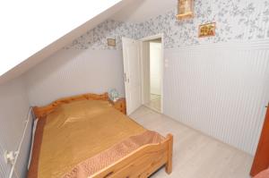 En eller flere senge i et værelse på Małgorzata 2