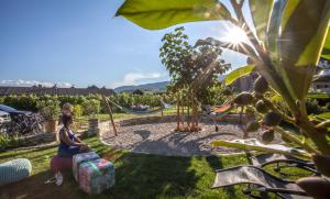 Un jardín fuera de Hotel Garni Weinquadrat