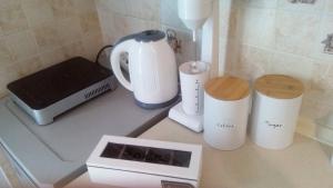 a kitchen counter with a blender and a toaster at Amazing Apartment In The Center in Alexandroupoli