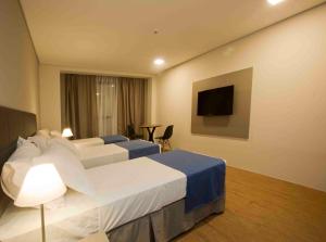 TV a/nebo společenská místnost v ubytování Fity Hotel