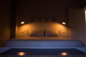 Ein Bett oder Betten in einem Zimmer der Unterkunft Il nido del Picchio