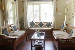 Uma área de estar em Hotel Nana Pokhara