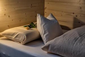 Llit o llits en una habitació de Gasthof Stocker